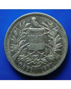 Guatemala 	 2 Reales	1897	Seated Justice; in her left hand the balance, on her right a horn of abundance. Her arm supported by constitution. Silver  XF-