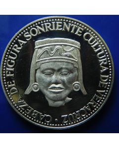 Paraguay 	 150 Guaranies	1973	 Head of smiling figure Culture of Veracruz 