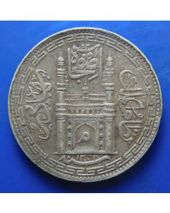 India - Princely States - Hyderabad	Mir Mahbub Ali Khan II	 Rupee	 AH1362//34	CharMinar (FourMinarets) gateway 